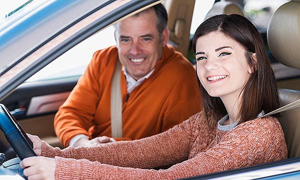 Teen driver completing a defensive driving course